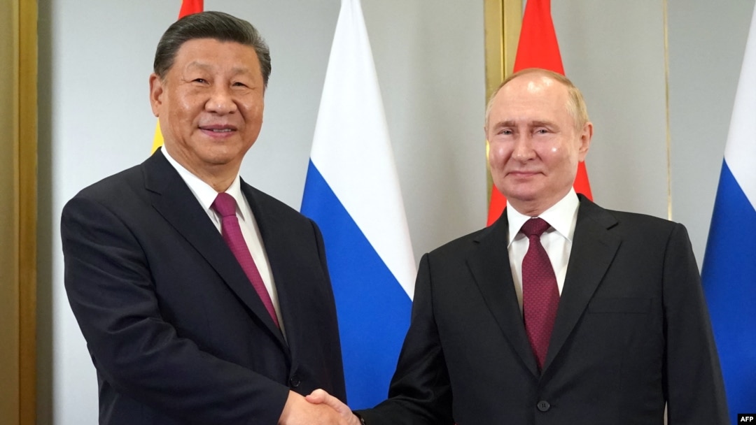 Владимир Путин и Си Цзиньпин на саммите Шанхайской организации сотрудничества (ШОС) в Астане 3 июля 2024 года. (Фото: Павел Волков / POOL / AFP)