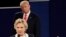 FILE - Republican presidential nominee Donald Trump listens to Democratic presidential nominee Hillary Clinton during the second presidential debate at Washington University in St. Louis, Oct. 9, 2016.