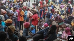 FILE - People displaced by armed gang attacks take refuge at the town hall of the Kenscoff neighborhood of Port-au-Prince, Haiti, Feb. 3, 2025. The Haitian government is canceling the national carnival that was going to be held in Fort Liberte.