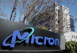 This Feb. 3, 2012 file photo shows the exterior view of memory chip maker Micron offices in San Jose, Calif.