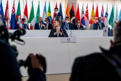 Italy's Foreign Minister Luigi Di Maio sits down to begin a G20 foreign ministers meeting in Matera, Italy, June 29, 2021.