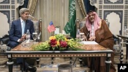 U.S. Secretary of State John Kerry meets with Saudi Foreign Minister Prince Saud al-Faisal at the Royal Terminal of the King Abdulaziz International Airport in Jiddah, Saudi Arabia, Sept. 11, 2014.