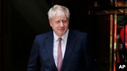British Conservative party lawmaker Boris Johnson leaves a TV station after giving an interview in London, June 14, 2019. 