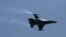 FILE - A Pakistani F-16 fighter performs during a ceremony marking Pakistan Defence Day in Islamabad, Pakistan.