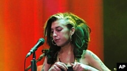 Amy Winehouse performs on stage during a concert in Belgrade, Serbia, June 18, 2011 (file photo)