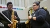 Courtney Brunson, left, and Steevan Galindo play saxophones during a rehearsal at Stax Music Academy, Jan. 30, 2025, in Memphis, Tenn. 