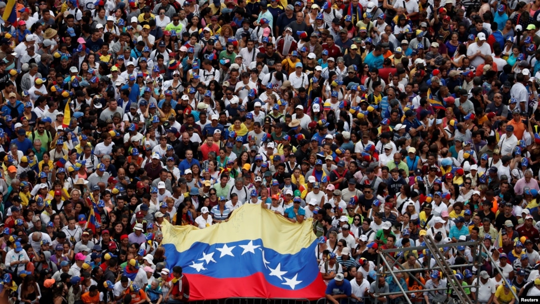 Opposition supporters take part in a rally against Venezuelan President Nicolas Maduro's government, in Caracas, Venezuela Jan. 23, 2019. 