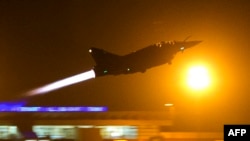 A French Mirage 2000 fighter jet of the Nancy-based 3/3 Fighter Squadron Ardennes takes off early for a Close Air Support (CAS) mission from Bamako's airport, Mali.