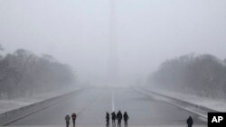 Snegom zavejani Vašington