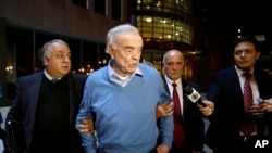 Jose Maria Marin quitte la Cour fédérale à New York, USA le 3 novembre 2015. 