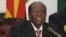 FILE: Zimbabwean President Robert Mugabe delivers a live speech to the nation, at State House, in Harare, Zimbabwe, Nov, 19, 2017. Mugabe baffled the country by ending his address without announcing his resignation.