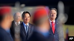 FILE - Taiwan's Vice President William Lai Ching-te, left, walks with Paraguay's Vice Foreign Minister Raul Silvero at Silvio Pettirossi Airport in Luque, Paraguay, Aug. 14, 2023. Paraguay is the only South American country with formal relations with Taiwan.