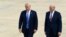 FILE - President Donald Trump and White House chief of staff John Kelly walk toward Air Force One at Andrews Air Force Base in Md., May 4, 2018. 