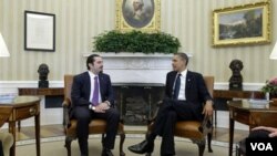 El primer ministro libanés Saad Hariri y el presidente Barack Obama se reunieron en la Sala Oval de la Casa Blanca, mientras en el Líbano renunciaba el gabinete.