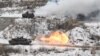 Tank K1A2 Korea Selatan (bawah) saat melakukan latihan tembak gabungan antara Korea Selatan dan AS di Pocheon pada 4 Januari 2024. (Foto: AFP)