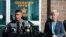 Santa Fe County Sheriff Adan Mendoza, left, speaks as District Attorney Mary Carmack-Altwies listens during a news conference in Santa Fe, New Mexico, Oct. 27, 2021. 