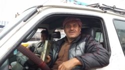 Omar Ali, 56, a bus driver, says he keeps his bus as clean as possible, but doesn't think the virus will spread in Sanaa, Yemen, May 4, 2020. (VOA/Naseh Shaker)