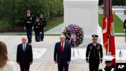 President Donald Trump stands with Vice President Mike Pence and Gen Omar Jones, Commanding General at Joint Force Headquarters, attend Memorial Day ceremony, May 25, 2020. 