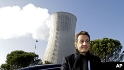 France's President Nicolas Sarkozy arrives for a visit to the nuclear power plant site of Areva in Tricastin, southern France, November 25, 2011.