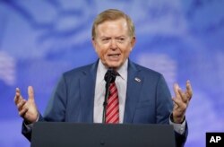 FILE - Lou Dobbs, with Fox News, speaks at the Conservative Political Action Conference (CPAC), Feb. 24, 2017, in Oxon Hill, Maryland.