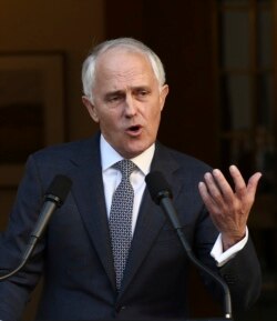 FILE - Malcolm Turnbull, then Australia's prime minister, announces his cabinet during a press conference at Parliament House in Canberra, Australia, Sept. 20, 2015.