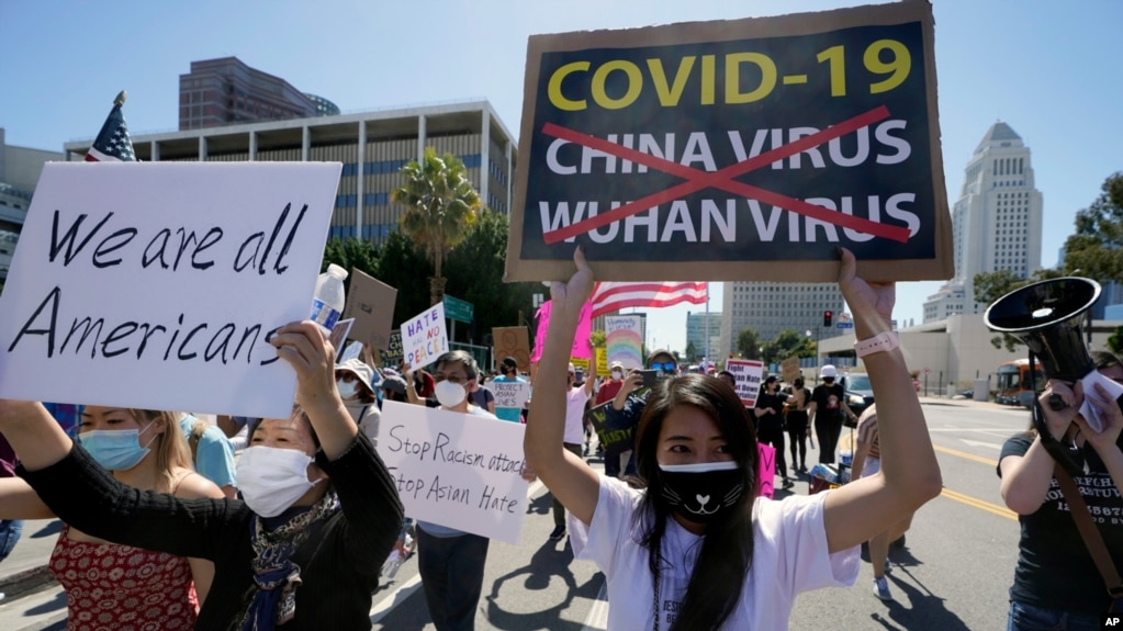 资料照片：亚裔社区民众在洛杉矶市中心进行反亚裔仇恨犯罪的抗议游行（2021年3月27日）(photo:VOA)
