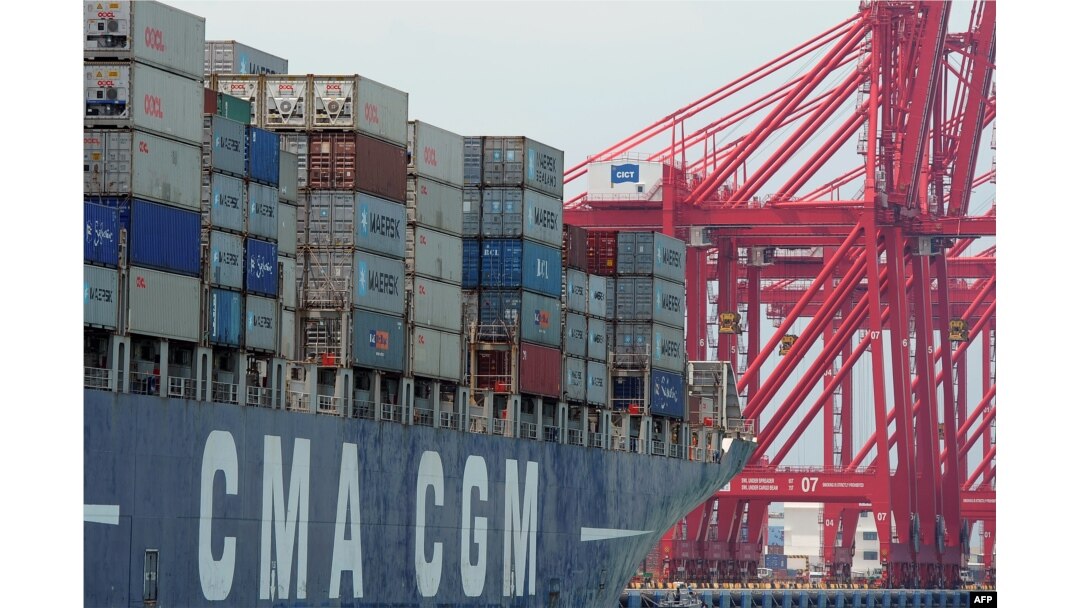 FILE - A ship loaded with containers ready for departure is seen berthed at the Chinese-majority owned Colombo International Container Terminal (CICT) in Colombo on March 30, 2016.