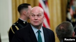 FILE - Acting U.S. Attorney General Matthew Whitaker attends a ceremony at the White House in Washington, Nov. 16, 2018.