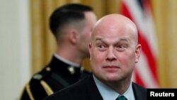 FILE - Acting U.S. Attorney General Matthew Whitaker attends a ceremony at the White House in Washington, Nov. 16, 2018.