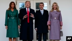 From left, first lady Melania Trump, President Donald Trump, Czech Prime Minister Andrej Babis and his wife, Monika Babisova, pose outside the Oval Office of the White House, in Washington, March 7, 2019.