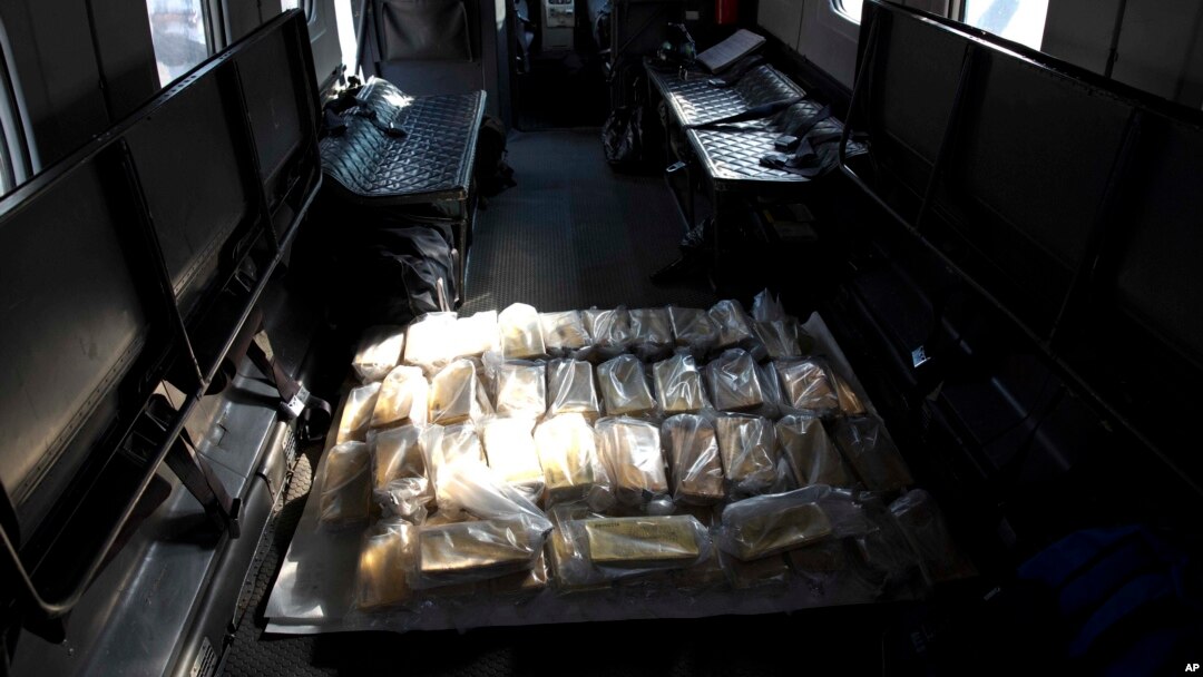 FILE - Gold bars sit inside a military plane before being taken to Venezuela's Central Bank, at Carlota military airport in Caracas, Venezuela, March 1, 2018.