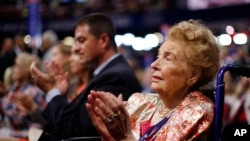 FILE - Missouri delegate Phyllis Schlafly watches during the second day session of the Republican National Convention in Cleveland, July 19, 2016.