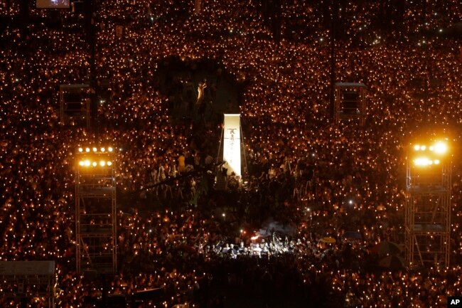 Thousands of people attend a candlelight vigil for victims of the Chinese government's brutal military crackdown three decades ago on protesters in Beijing's Tiananmen Square at Victoria Park in Hong Kong, June 4, 2019.