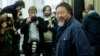 FILE - Chinese artist and dissident Ai Weiwei arrives for a news conference in Berlin, Oct. 26, 2015. 