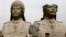 FILE - U.S. soldiers walk past two gigantic status of former Iraqi President Saddam Hussein in Baghdad, March 20, 2009.