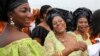 FILE - Delegates from Delta state take part in a parade during the "peace rally" organized by the National Council for Women's Societies (NCWS) in Abuja, Nigeria, Aug. 15, 2013.