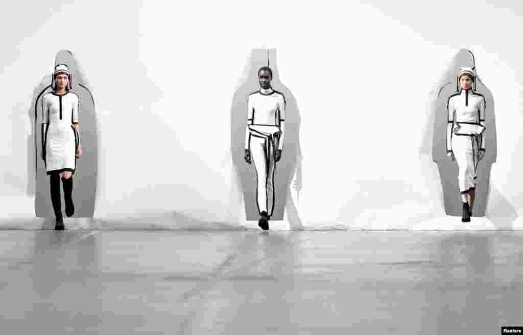 Models present creations by designer Satoshi Kondo as part of his Fall/Winter 2020/21 women's ready-to-wear collection show for fashion house Issey Miyake during Paris Fashion Week in Paris, France.