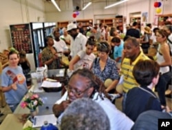 A diverse crowd fills the Old North Grocery Co-op on opening day.