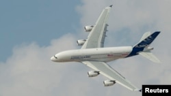  An Airbus A380, the world's largest passenger jet, flies during the Dubai Airshow, Nov. 18, 2013.