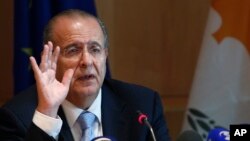 FILE - Cyprus Foreign Minister Ioannis Kasoulides speaks to the media at the foreign house in divided capital of Nicosia, Oct. 6, 2014. 