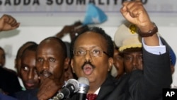 New Somali President Mohamed Abdullahi Farmajo celebrates winning the election and taking office in Mogadishu, Somalia Wednesday, Feb. 8, 2017.