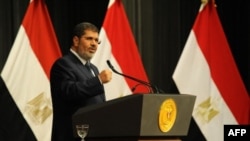 Egyptian President Mohammed Morsi addresses conference June 26, 2013 in Cairo (Egyptian Presidency photo)