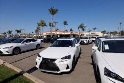 FILE - New Lexus automobiles are shown for sale after California Governor Gavin Newsom announced the state would ban the sale of new gasoline-powered passenger cars and trucks starting in 2035.