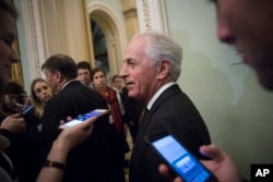 FILE - Senate Foreign Relations Committee Chairman Bob Corker, R-Tenn., leaves a weekly GOP policy lunch on Capitol Hill in Washington, March 20, 2018.