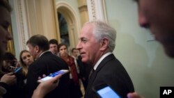 FILE - Senate Foreign Relations Committee Chairman Bob Corker, R-Tenn., leaves a weekly GOP policy lunch on Capitol Hill in Washington, March 20, 2018. 