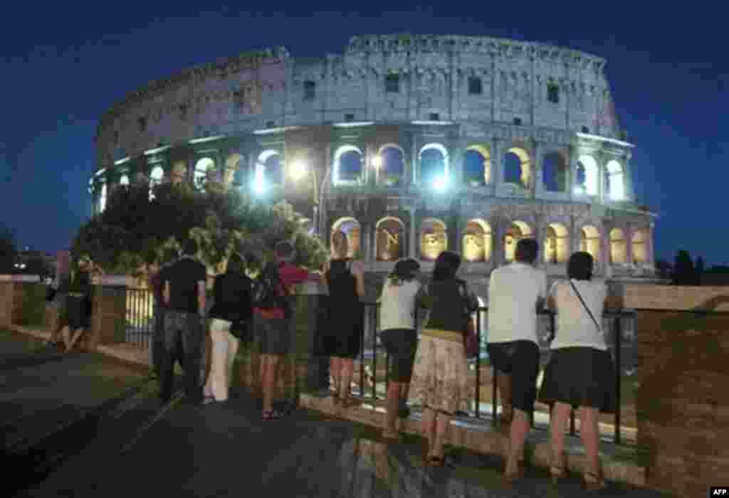 The Colosseum is lit up in Rome, Sunday, Sept. 11, 2011, to mark the 10th anniversary of the Sept. 11 attacks on the United States. A decade after 9/11, the day that changed so much for so many people, the world's leaders and citizens paused to reflect Su