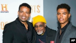 FILE - From left, Mario, Melvin and Mandela Van Peebles attend The History Channel's "Roots" mini-series premiere at Alice Tully Hall, May 23, 2016, in New York. Melvin Van Peebles died Sept. 21, 2021, at age 89.