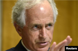 FILE - Sen. Bob Corker, R-Tenn., says it's essential that ongoing FBI investigations are "free of political interference."