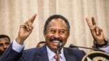 FILE - Sudan's new Prime Minister Abdalla Hamdok speaks during a press conference in Khartoum, Sudan, Aug. 21, 2019. 