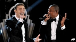 Recording artists Just Timberlake, left, and Jay-Z performing at the 55th annual Grammy Awards in Los Angeles, Feb. 10, 2013.
